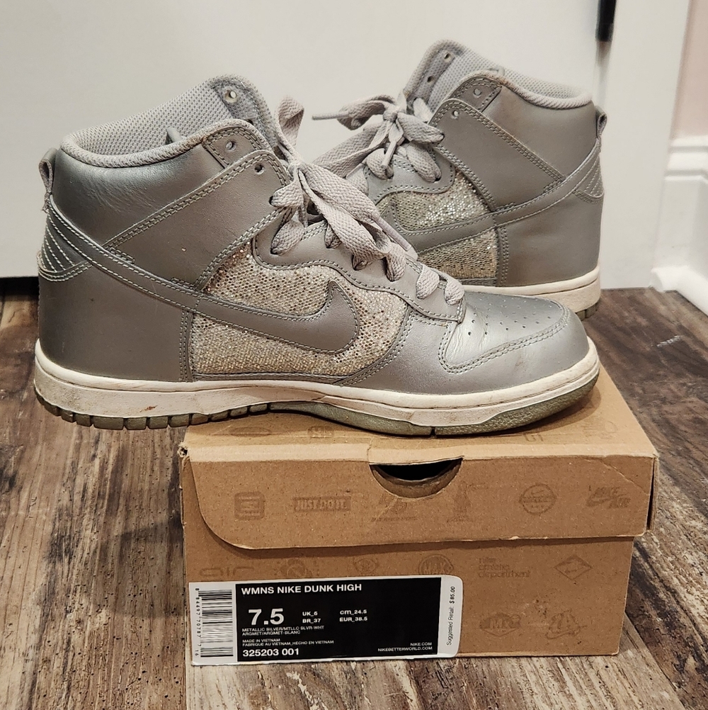 Nike Women’s Dunk High Sneakers in Light Gray with Metallic Panels